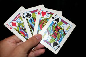 four Jack playing cards from a deck