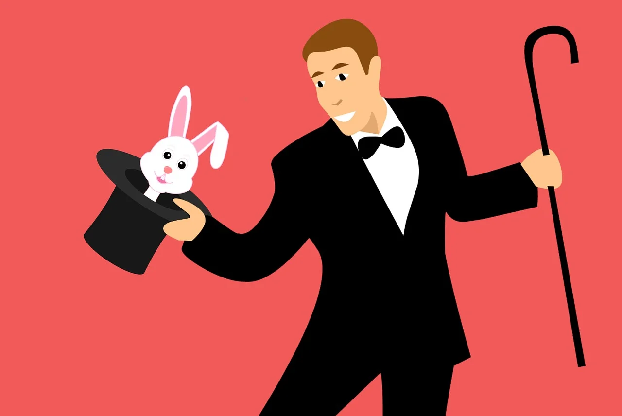 Magician performing magic trick rabbit out of hat